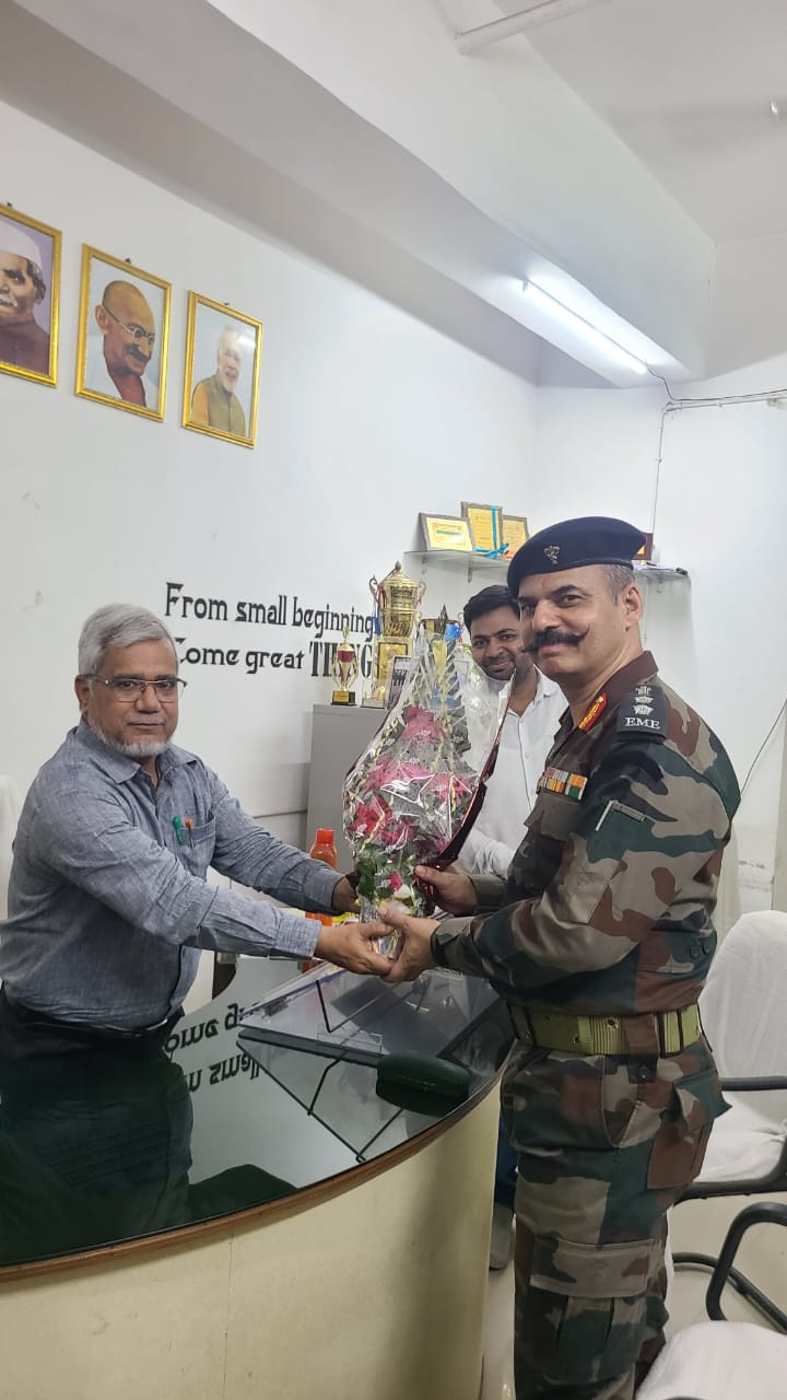 NCC Officer Presenting A Bouquet to the Principal